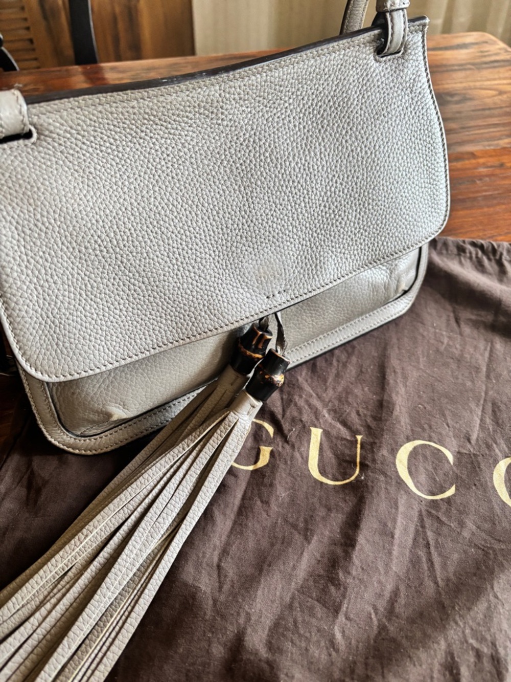 Gucci Pebbled Leather Shoulder Bag in Light Gray with Tassel Accent
